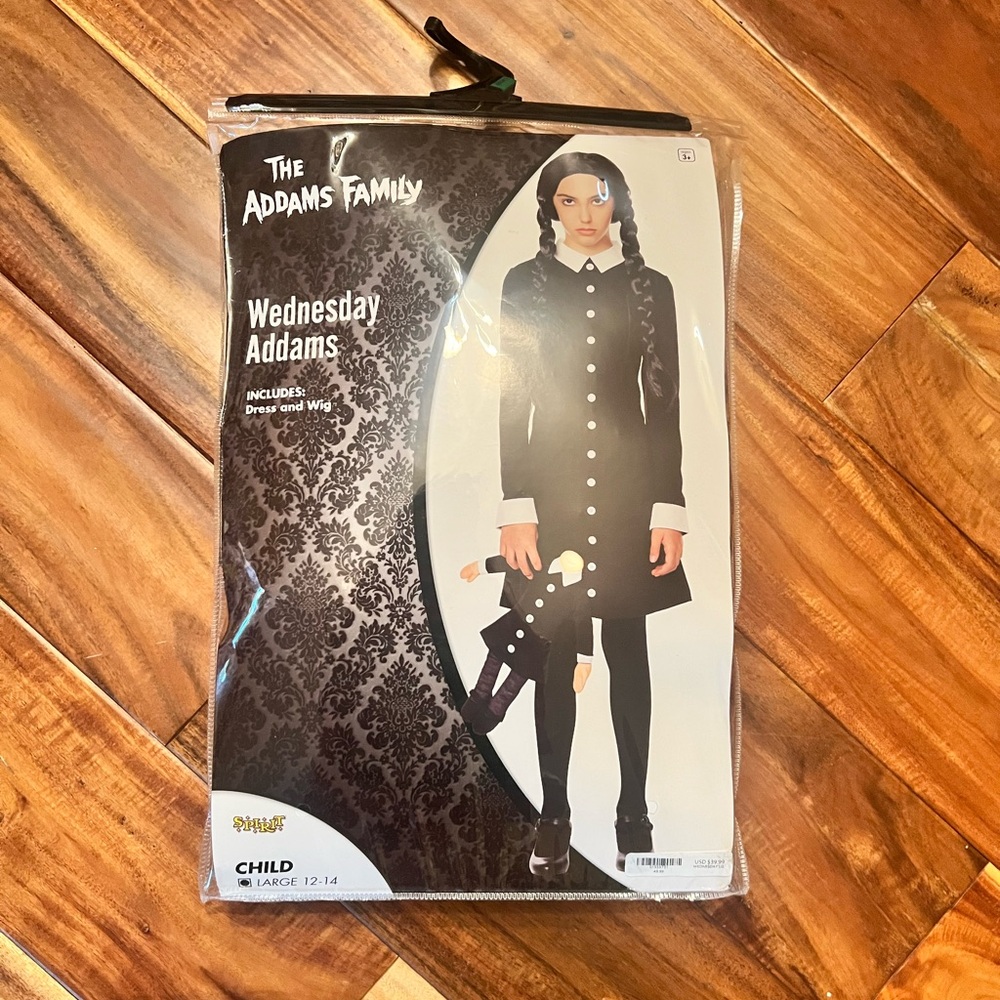Girl’s Wednesday Addams halloween costume. Size large 12/14.